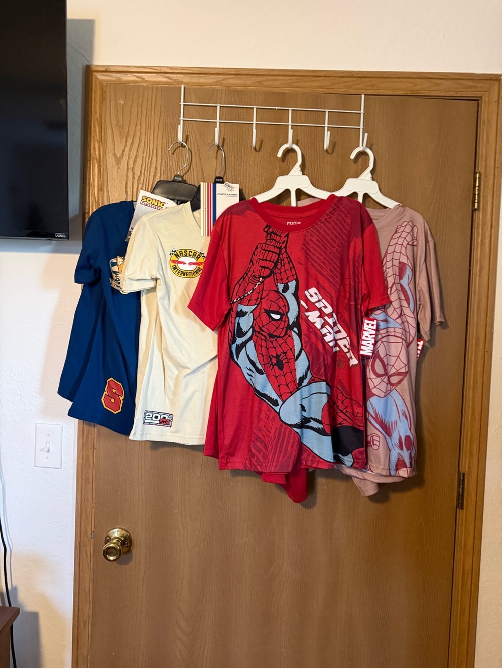 Four Short and Shirt sets. Size 14/16. Marvel, NASCAR and Sonic hedgehog. New